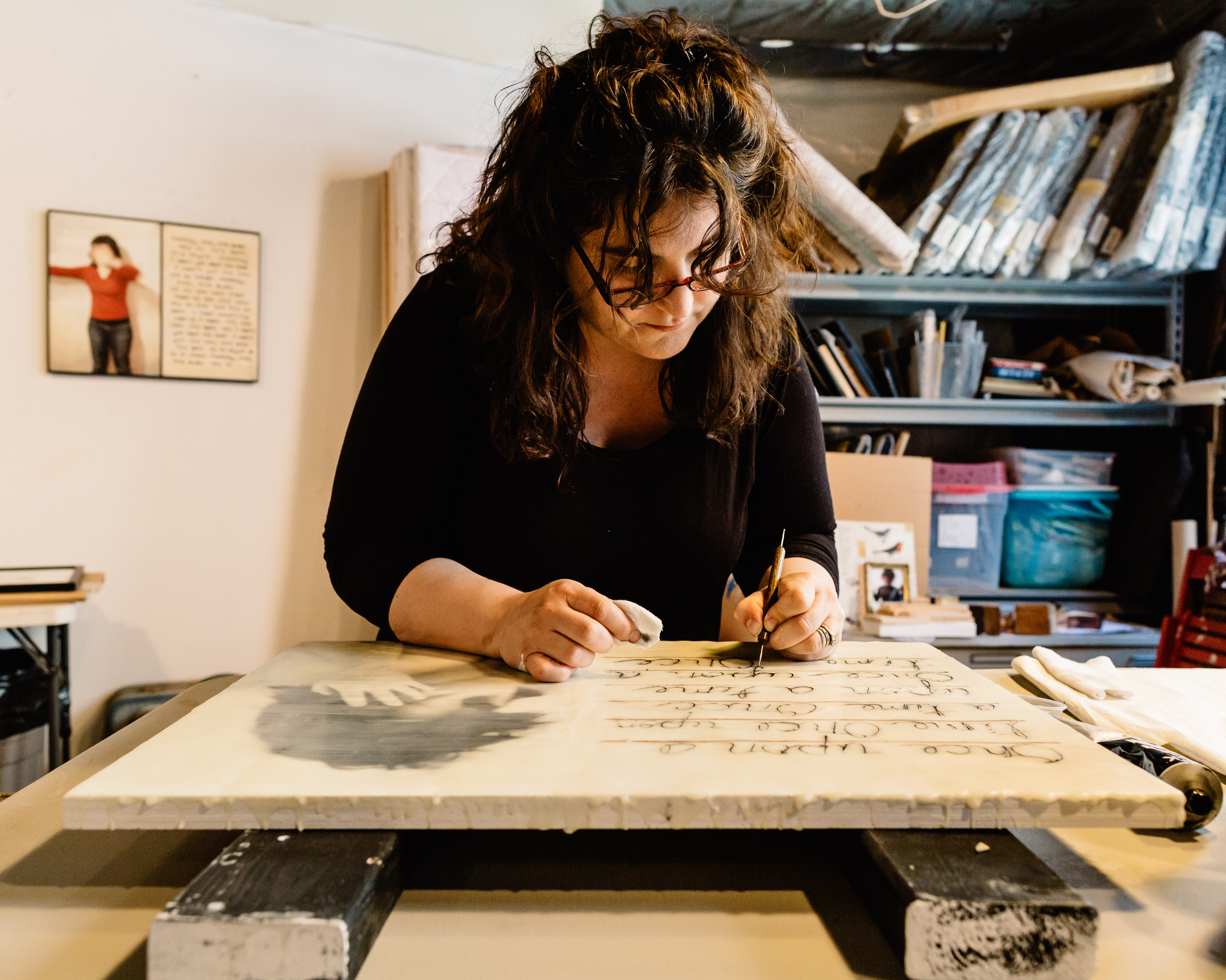 Photograph of Jessica Burko at work in her studio